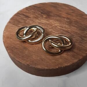 Gold Tone Knotted Clip Earrings